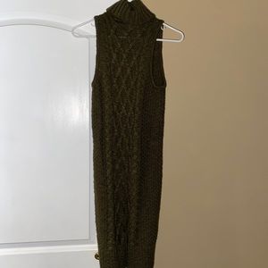 Green knitted turtle neck sweater